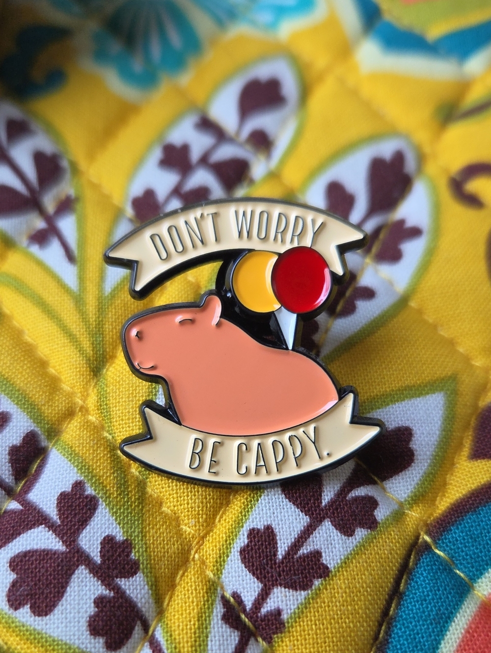 Don’t Worry Be Cappy Enamel Pin - Peach Capybara Design